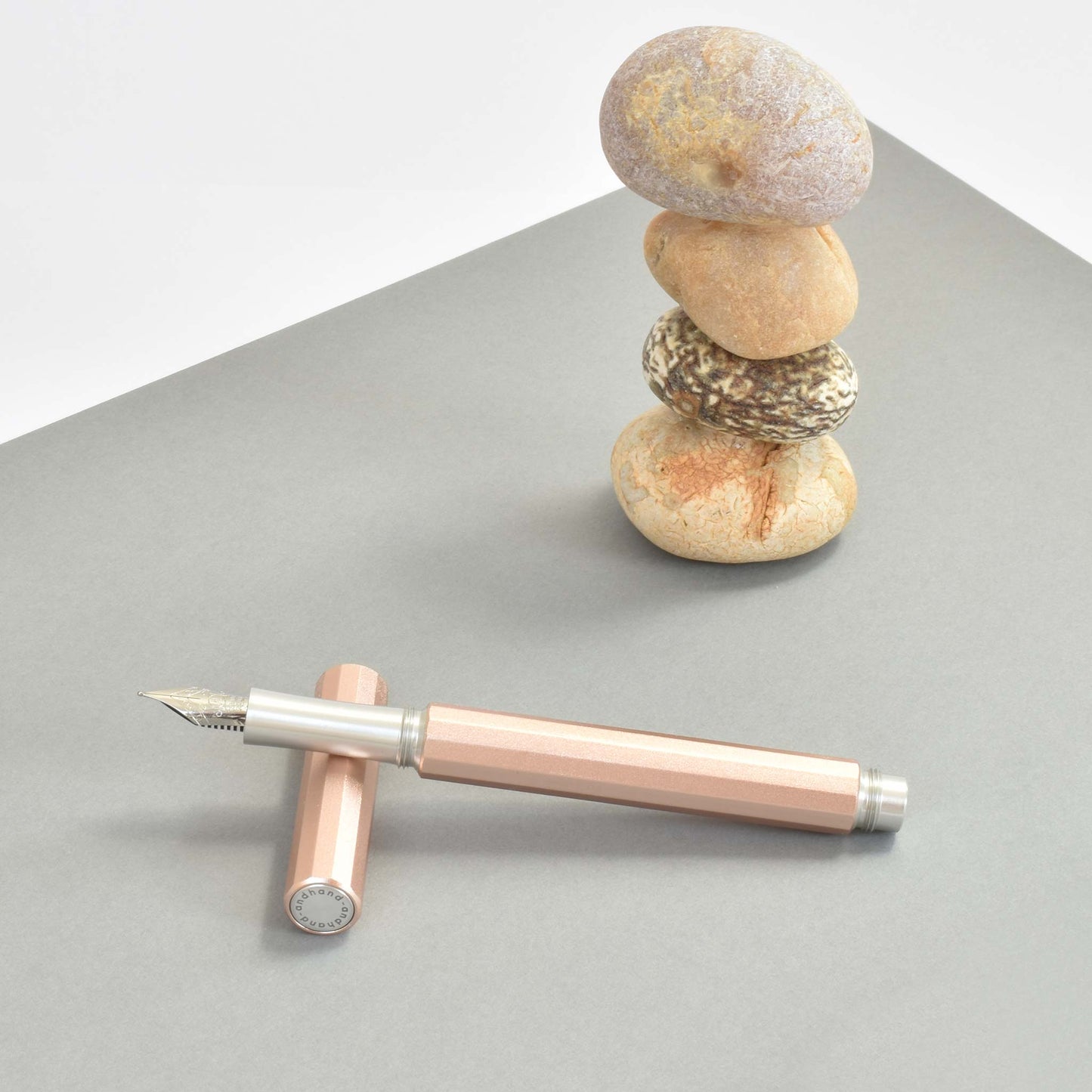 Aspect fountain pen in blush pink anodized finish.