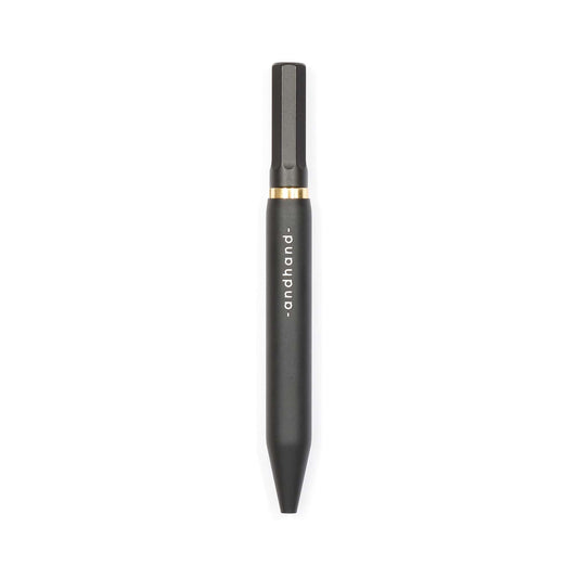 Aluminium and brass everyday carry black pen from Andhand. An expert compact writing tool with a smooth mechanism and modern minimal design. Amazingly durable and refined 4 inch pen. Shown here in black satin anodized finish.