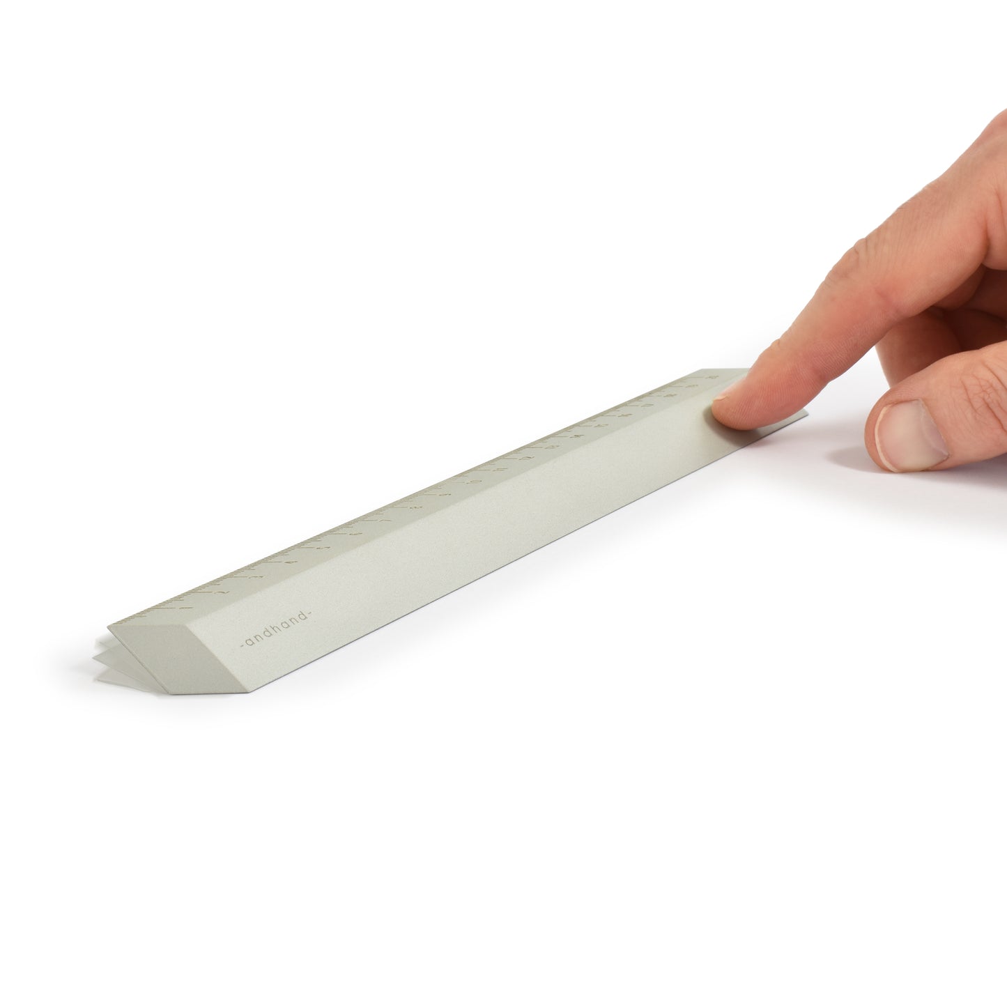 The illusion ruler by Andhand, modern and striking design. Its angled profile allows for extremely accurate mark making and measurements in both metric and imperial. Shown here in silver satin anodized finish.