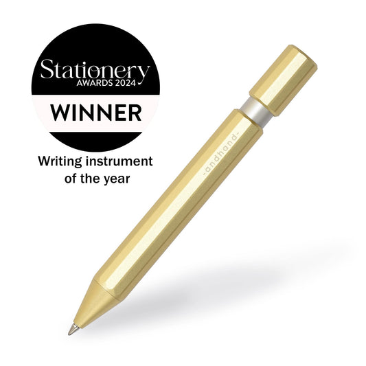 Aspect retractable pen in gold lustre anodized finish. A great pen for journaling, sketching or note taking. Equipped with a capless system rollerball cartridge for great ink flow. Writing instrument of the year, stationery awards 2024.