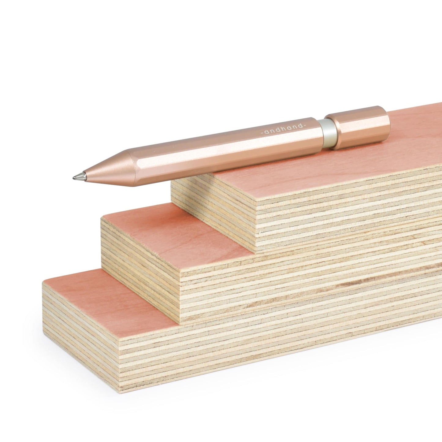 Aspect retractable pen in blush pink anodized finish. A great pen for journaling, sketching or note taking. Equipped with a capless system rollerball cartridge for great ink flow.