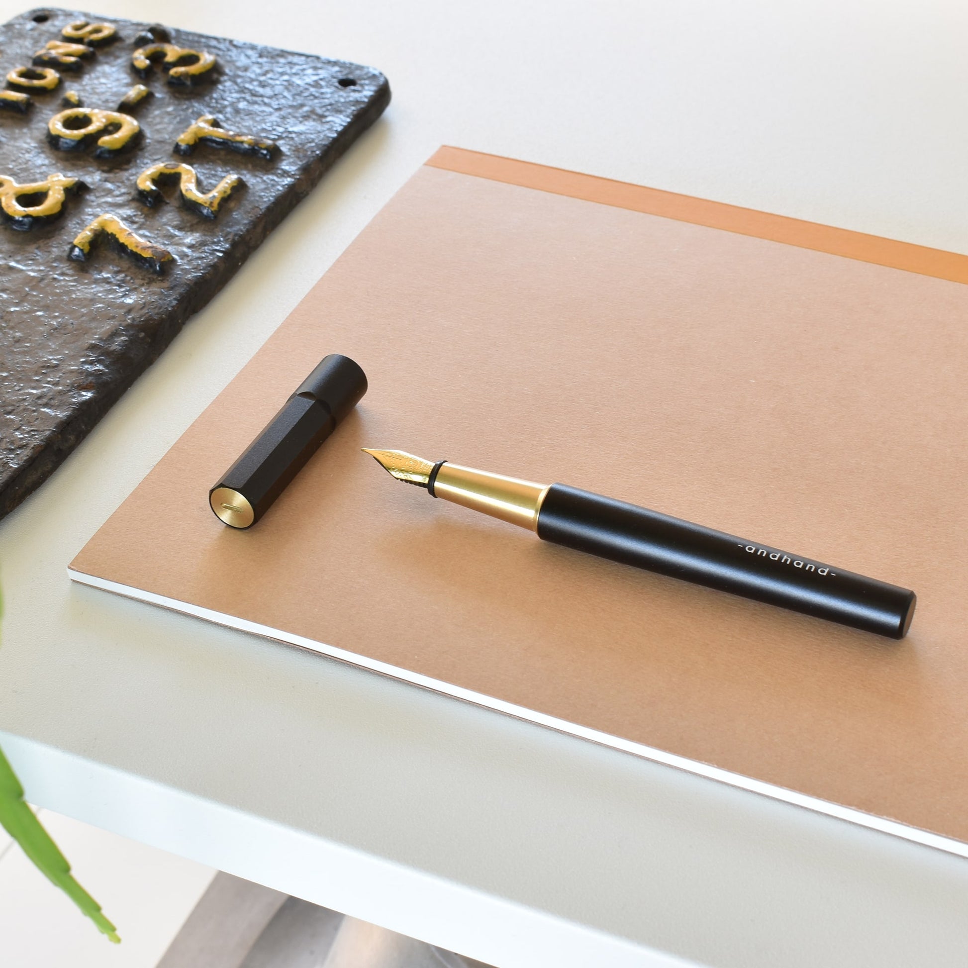 Method Fountain Pen in Black + Brass by Andhand. Brass and aluminium pen with gold plated nib. Ideal fountain pen for writing, lightweight and sleek design.