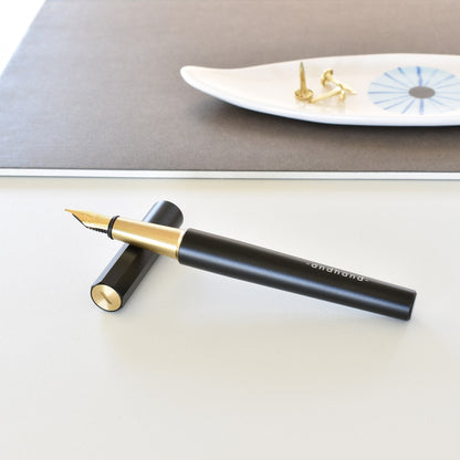 Method Fountain Pen in Black + Brass by Andhand. Brass and aluminium pen with gold plated nib. Ideal fountain pen for writing, lightweight and sleek design.