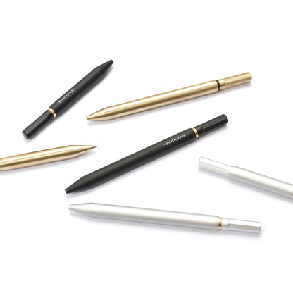 Solid aluminium & brass ballpoint black pen from Andhand. An expertly precise writing tool with a smooth mechanism and modern minimal design. Amazingly durable and refined. Shown here in black satin anodized finish.