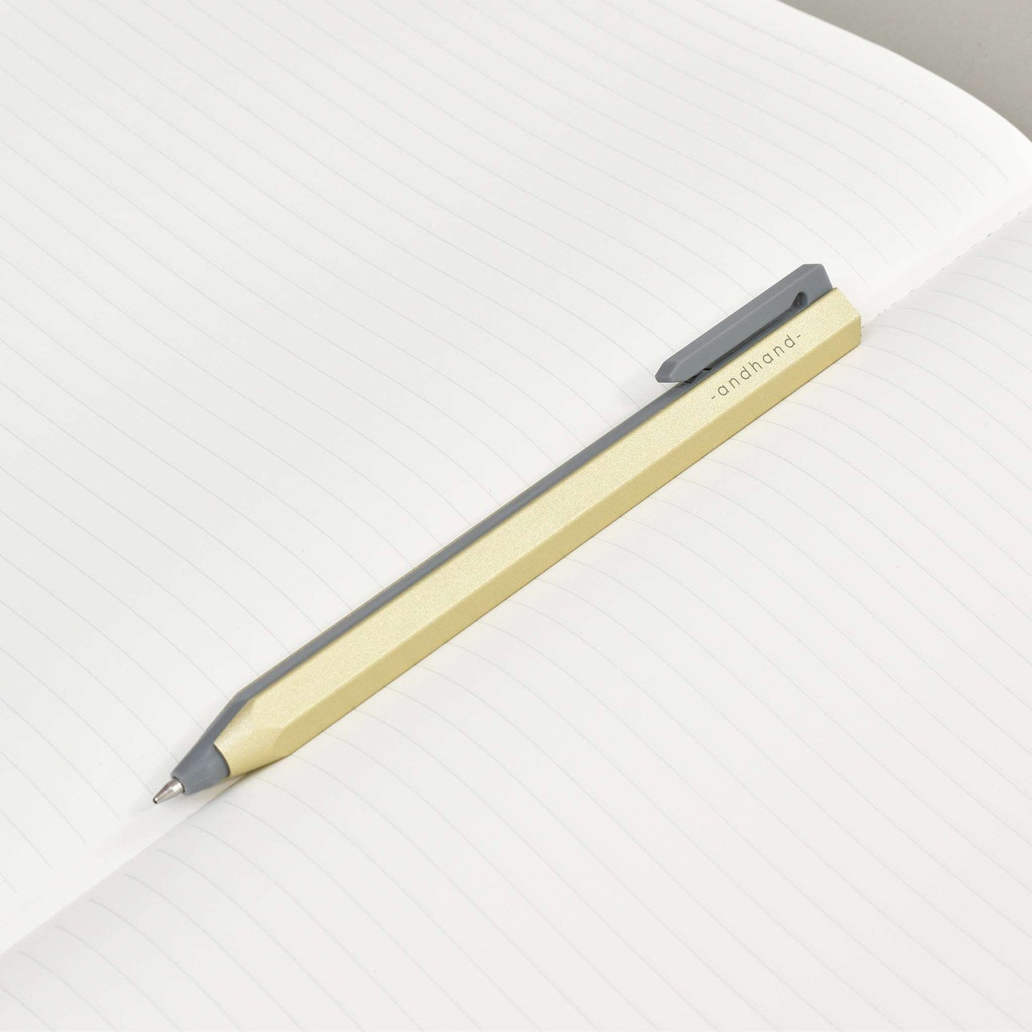 Core retractable pen is elegantly minimal in design and has been crafted from a durable palette of materials. Unique retracting mechanism and stylish gold finish.