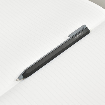Core retractable pen in black finish. It is elegantly minimal in design and has been crafted from a durable palette of materials. Unique retracting mechanism and stylish modern form.