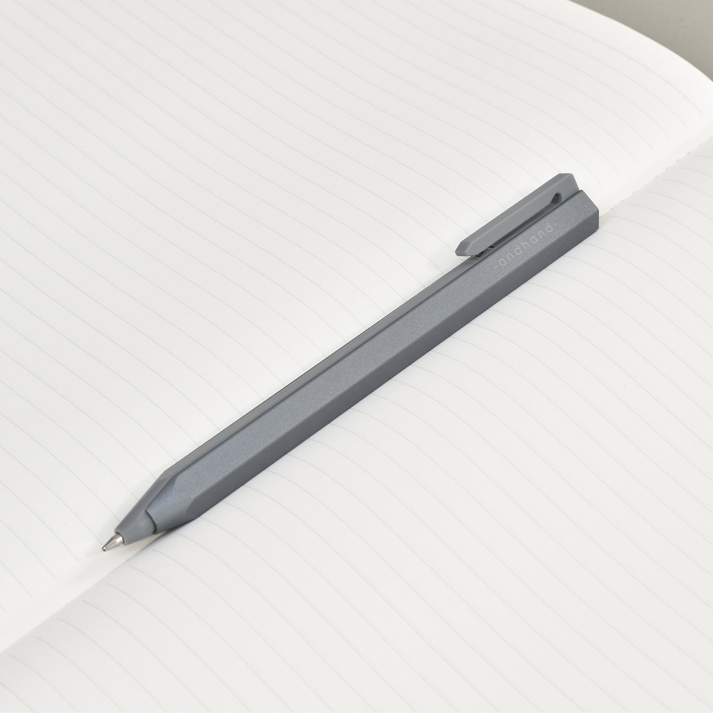Core retractable pen is elegantly minimal in design and has been crafted from a durable palette of materials. Unique retracting mechanism and stylish slate grey finish.