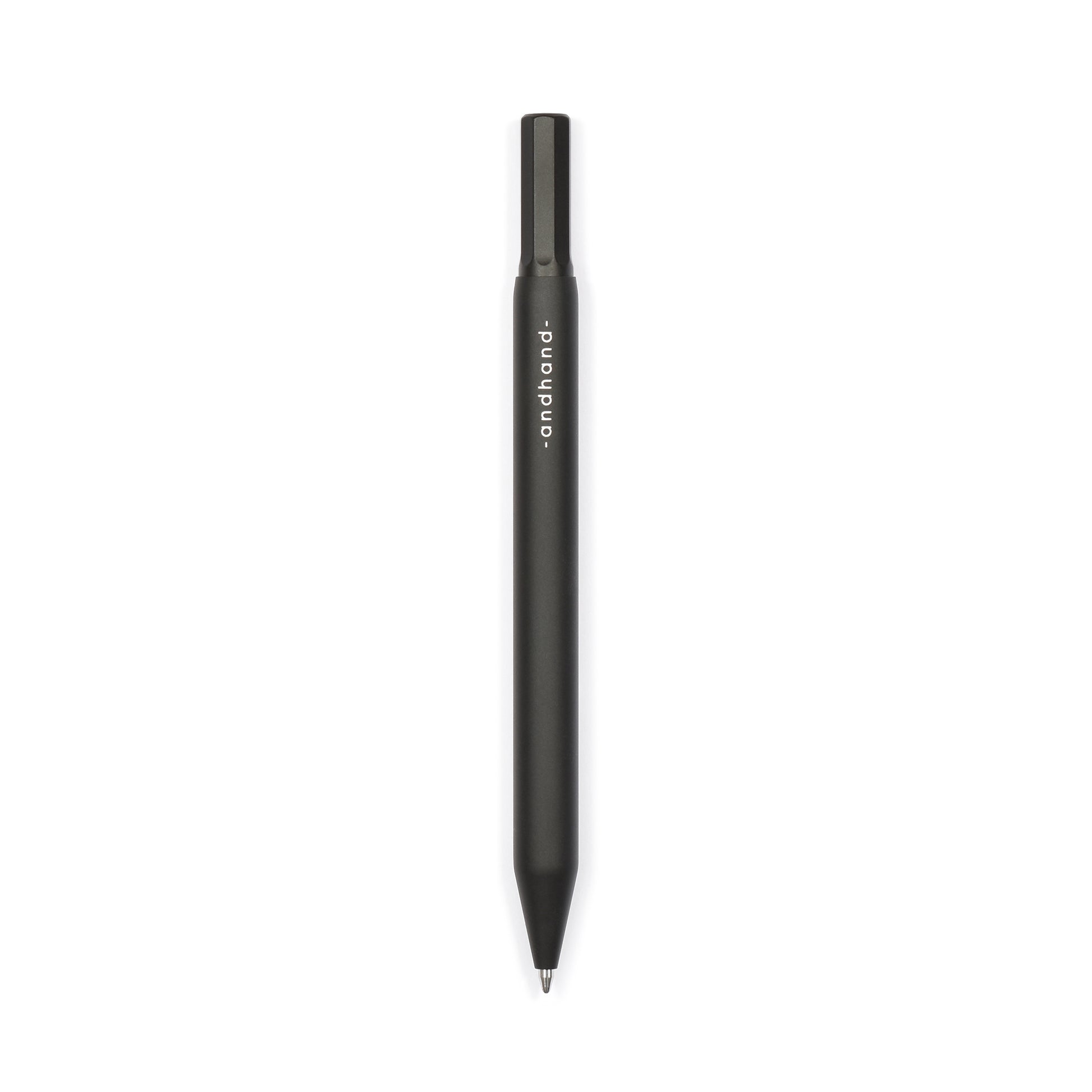 Solid aluminium & brass ballpoint black pen from Andhand. An expertly precise writing tool with a smooth mechanism and modern minimal design. Amazingly durable and refined. Shown here in black satin anodized finish.