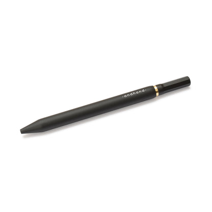 Solid aluminium & brass ballpoint black pen from Andhand. An expertly precise writing tool with a smooth mechanism and modern minimal design. Amazingly durable and refined. Shown here in black satin anodized finish.