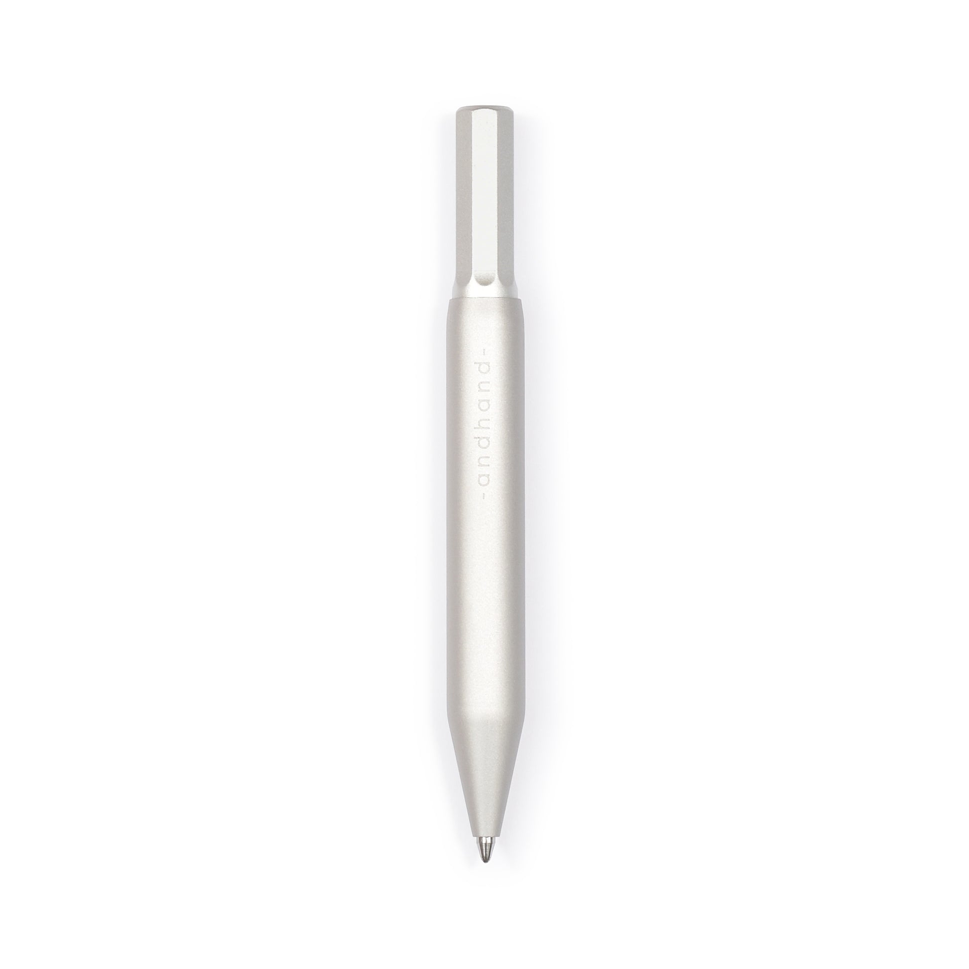 Aluminium and brass everyday carry ballpoint pen from Andhand. An expert compact writing tool with a smooth mechanism and modern minimal design. Amazingly durable and refined 4 inch pen. Shown here in silver lustre anodized finish.
