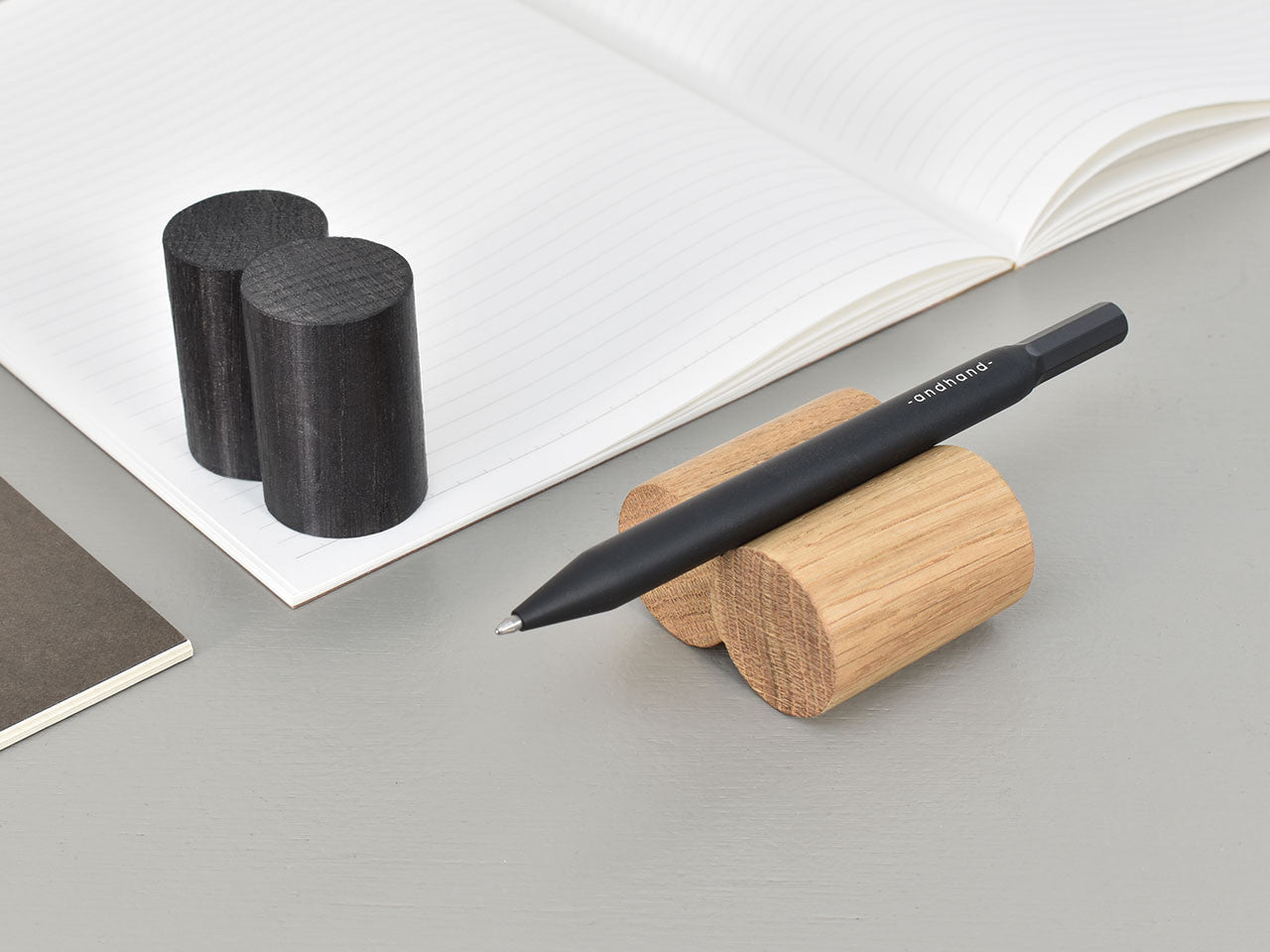 Oo pen rest, solid oak and black stained finish. Beautiful wood joinery.