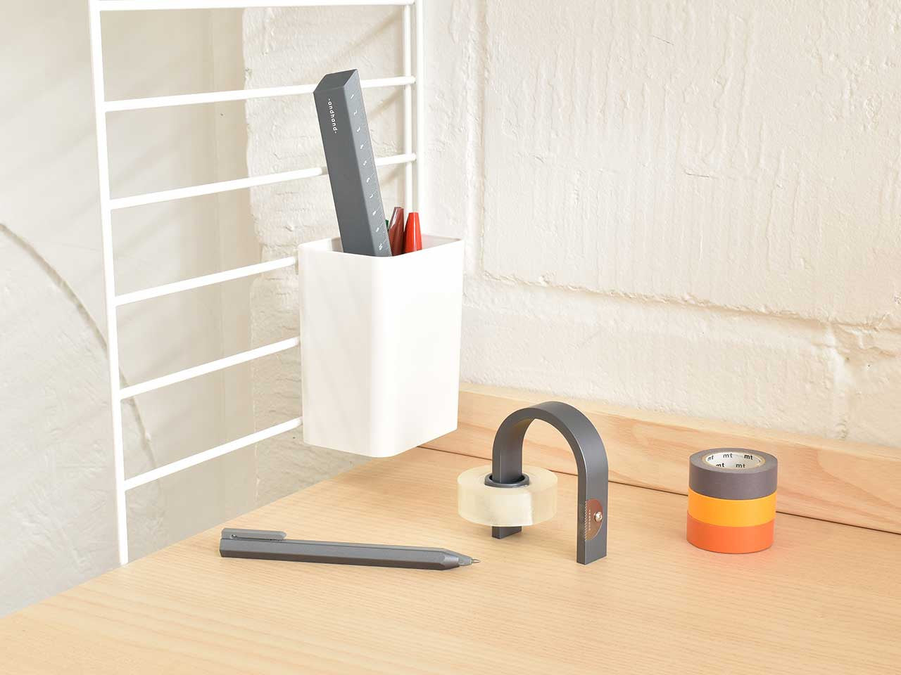 Hoop tape dispenser by Andhand. Minimal and durable tape dispenser in slate grey finish. Tape with dispenser.